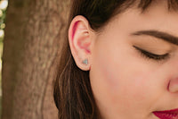 Sterling silver hammered tiny triangle studs earrings Amanda K Lockrow